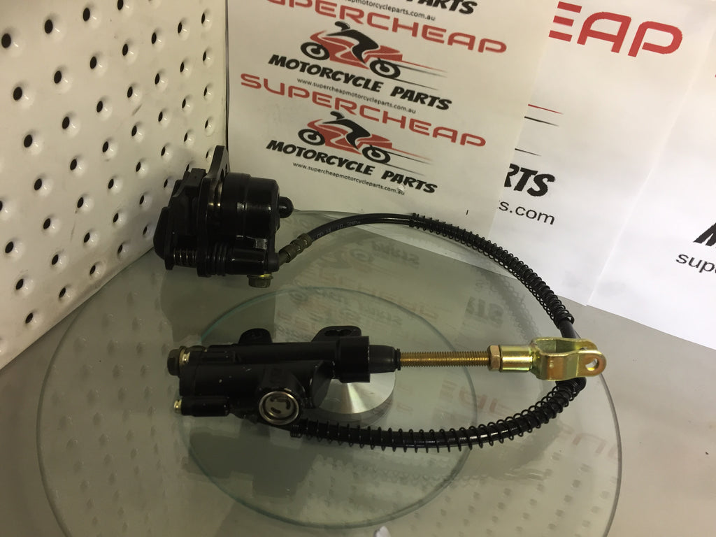 Rear Caliper, C029-060 includes Master Cylinder, brake pads and line. image 3